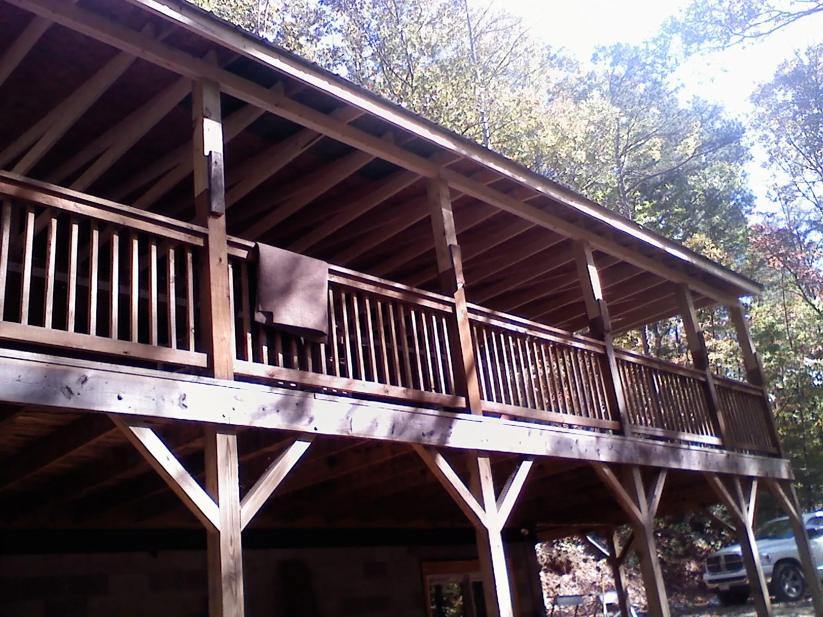 Timber framing under a new elevated porch and deck — Roof Leak Repair in Bentleyville by Roofing Brothers